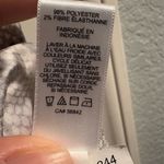 EXPRESS Short Sleeve Women’s V-Neck Polyester Spandex Snakeskin Top Large Photo 3