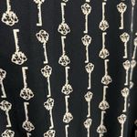 Millibon Key Design Romper Bell Sleeves Photo 3