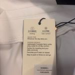 Calia by Carrie Underwood Mid Rise Shorts in Pure White Large Journey Collection Photo 5