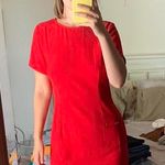 About Us Red Dress Photo 0