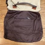 Classic Fashion Outback bag. Tan with pebbled leather handles and trim. Photo 3