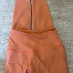 Beyond Yoga  leggings size small orange glitter  Photo 1