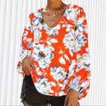 Pretty red lightweight blouse with bold floral design! Has cute balloon … Size 14 Photo 0