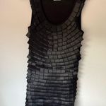 Black bow dress
Back is spandex
Size small Photo 1