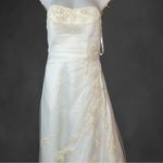David's Bridal . Style T8818 size 10 wedding dress. 
Worn once. Was cleaned. Photo 3