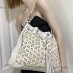 Brighton Perforated Daisy Drawstring Tassel Leather White Shoulder Hobo Bag Photo 1