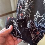 ASTR  Black and White Floral Romper with Bell Sleeves Photo 8