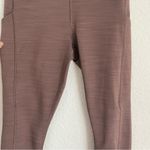 Athleta mauve pink 7/8 high waist ultimate stash pocket leggings, size XS Photo 2