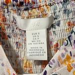 H&M  small short fitted blouse low-cut v-neck short puff sleeves elastic at cuffs Photo 3