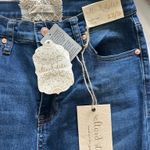 Altar'd State  High-Rise Jeans Flare 27 Medium Wash Distressed Stretch Photo 1