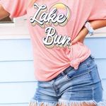 Jadelynn Brooke  Lake Bum V-neck Graphic T-shirt Photo 0