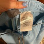 Nike Light Blue Track Pants with White Stripe Photo 4