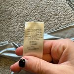 Babaton  Black Asymmetrical Long Sleeve Top Photo 4