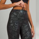 Lululemon ‎ Size 6 Wunder Train High Rise Tight Black Iridescent Foil Full Length Photo 5