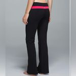 Lululemon Women’s Sz 12 Groove Pant in Black/Bloom Juice Photo 1