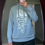 The North Face Hooded Sweatshirt Photo 0