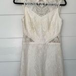 Alexis Women’s Medium Cream Lace Cutout MIDI Dress Photo 0