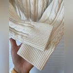 1. State Cable Knit Drop Shoulder Fringe Crop Sweater Photo 3