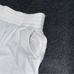 Athleta  Weekender High Rise 3” Run Shorts White Women’s Medium Photo 6