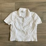 Outdoor Voices  white polo shirt Photo 0