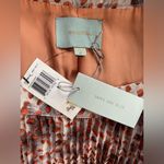 Skies Are Blue  Orange Dot Pleated Skirt Photo 1