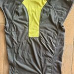 Nike Dri-Fit short sleeve tennis top. Black and yellow. Size small. Photo 2