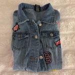 Almost Famous Junior Variety Patch Denim Jean Jacket Size Medium Photo 1