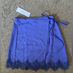 Urban Outfitters blue / purple mini skirt size small with lace on bottom NWT Photo 3