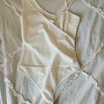 Vestique White Bodysuit Photo 0