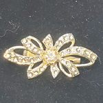 Silver Tone Clear Rhinestone Bow Unsigned Vtg Photo 1