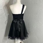 Teeze Me  Black One Shoulder Dress with White Floral Accent Photo 4