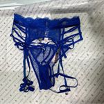 Victoria's Secret Victoria’s Secret Fishnet String Cheeky Panty and Garter Photo 2