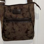 CREATIVE MEMORIES BRAND… BROWN FLORAL QUILTED BAG ADJUSTABLE STRAP
ZIP POCKETS Photo 1