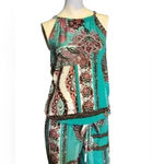 Flirty Pink floral print open back Green jumpsuit Size M Size M Photo 1