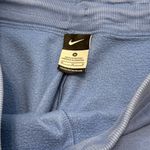 Nike women's medium blue fleece lined sweatpants Photo 1