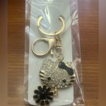 Hello Kitty Gold and Black  Keychain Photo 1