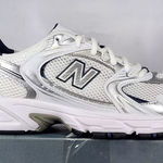 New Balance Women's size 6.5/Mens size 5  530 white blue silver Photo 0