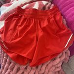 Lululemon red/orange  hotty hot size 2 tall Photo 0