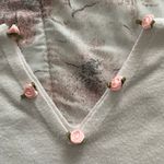 White Little Roses On V Photo 4