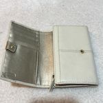 Coach leather bi fold women wallet Photo 1