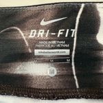 Nike DriFit Running TwistyPrint Athletic Crop Leggings Womens Medium Black/White Photo 4