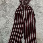 Spaghetti strap cami shirred red, white and black striped wide leg jumpsuit Photo 0