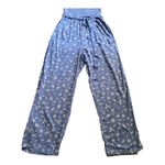 American Eagle OMG How cute is this jumpsuit, blue with small white flowers, smocked halter top, matching belt, has side hand pockets, excellent condition, size small Photo 4