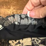 Covington  Black Floral Stretch Waist Midi Skirt Size 10 Photo 3