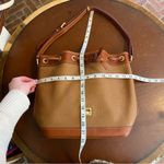 Dooney & Bourke  Pebble Grain Drawstring Hobo Bucket Bag Brown Pink Interior Photo 7