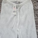 White Mesh Flare Pants Liv & Lottie Size M. Size M Photo 1