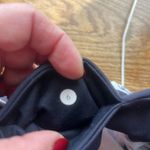 Lululemon Lulu leggings. Floral print, gray, black and pink. Photo 2