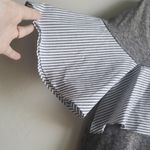 A. OK Coevolution gray shirt w ruffle sleeve Size M Photo 1