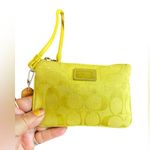 Coach  Zip Neon Yellow wristlet in signature canvas Photo 1