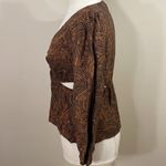 A New Day Deep v twist Front Cut Out balloon sleeve top Photo 2